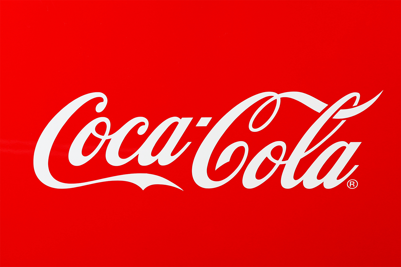 Image of the Coca Cola logo on a red background to support Coca Cola CEO article