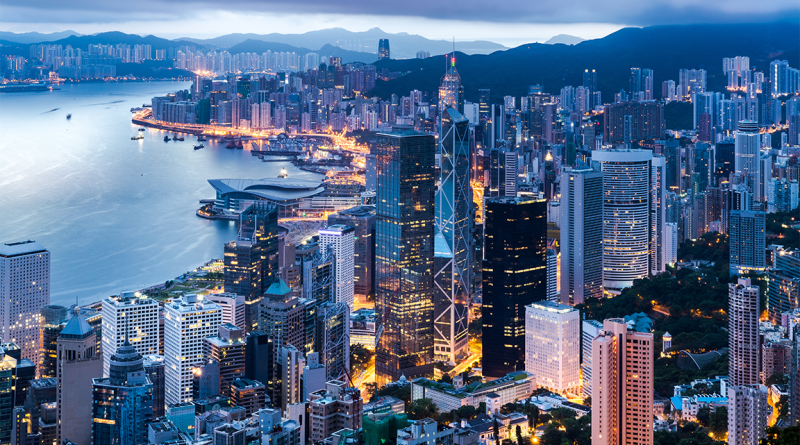 Panoramic view of the Hong Kong skyline at night to support one country two systems article