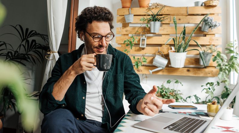 Man working on a laptop from home to support Spotify remote work article