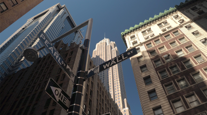 Wall Street sign in Lower Manhattan New York financial district to support US banks profit article