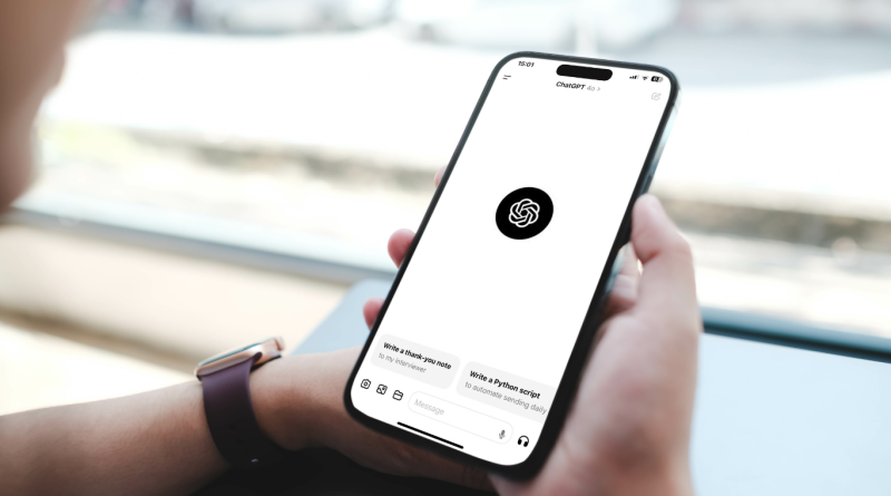 Person using a smartphone with the ChatGPT app open, exploring AI-powered startup companies.